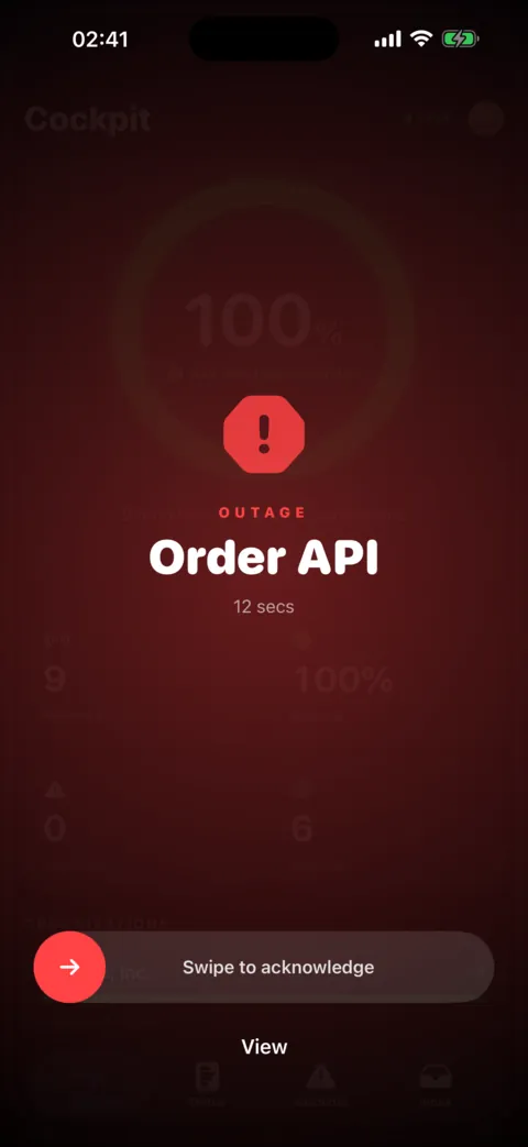 Full-screen Perstat outage alert for Order API on iPhone with a swipe control to acknowledge